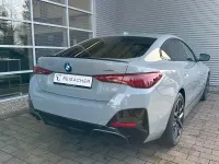 Gebraucht BMW i4 Comfort Edition 250 kW (340 PS) 2026 M brooklyn grau metallic Limousine