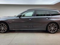 Gebraucht BMW 330e Advantage 292 PS (214 kW) 2021 Mineralgrau Kombi