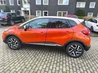 Używany Renault Captur Luxe 120 KM (88 kW) 2015 Pomarańczowy SUV