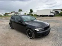 Używany BMW 116 122 KM (89 kW) 2011 Czarny Hatchback