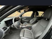 Gebraucht BMW 320e 163 PS (119 kW) 2022 Schwarz Limousine