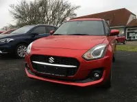 Gebraucht Suzuki Swift Comfort 83 PS (61 kW) 2023 Burning red pearl metallic Kleinwagen