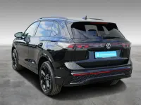 Gebraucht VW Tiguan R-line 272 PS (200 kW) 2025 0e grenadillschwarz metallic SUV