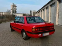 Gebraucht Mazda 323S 84 PS (61 kW) 1991 Rot Limousine