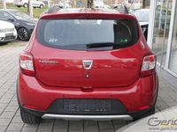 Gebraucht Dacia Sandero Prestige 90 PS (66 kW) 2015 Flammenrot metallic Kleinwagen