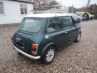 Second-hand Mini 1300 63 CP (46 kW) 1995 Verde Hatchback