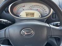 Gebraucht Daihatsu Sirion 69 PS (50 kW) 2010 Schwarz Kleinwagen