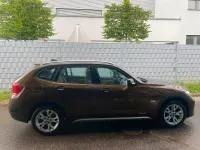 Gebraucht BMW X1 258 PS (189 kW) 2009 Braun SUV