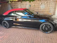 Gebraucht Mercedes C180 AMG line 156 PS (114 kW) 2023 Schwarz Cabrio