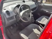Gebraucht Opel Agila 65 PS (47 kW) 2009 Rot Kleinwagen