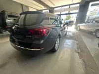 Używany Opel Astra Exklusiv 140 KM (102 kW) 2015 Szary Kombi