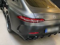 gebraucht Mercedes AMG GT 53 / voll 21 Zoll matt schwarz tüv neu