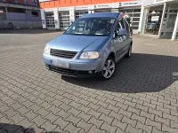 Second-hand VW Caddy Style 105 CP (77 kW) 2011 Argintiu Monovolum