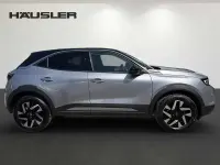 Gebraucht Opel Mokka Elegance 131 PS (96 kW) 2024 Kontrast grau (metallic) SUV