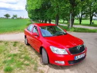 Używany Skoda Octavia Elegance 105 KM (77 kW) 2012 Czerwony Sedan/Limuzyna