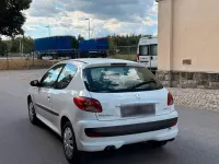 Gebraucht Peugeot 206+ 75 PS (55 kW) 2009 Weiß Kleinwagen