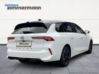 Gebraucht Opel Astra 131 PS (96 kW) 2024 Lack weiss banquise/typ aussenverkleidun Kombi