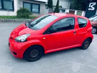 Gebraucht Toyota Aygo 68 PS (50 kW) 2009 Rot Kleinwagen