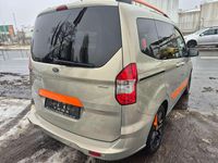 Gebraucht Ford Tourneo Courier Titanium 101 PS (74 kW) 2017 Titangrau metallic Van / Kleinbus