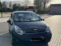 Gebraucht Kia Rio 109 PS (80 kW) 2013 Schwarz Limousine