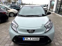Gebraucht Toyota Aygo X Team 72 PS (52 kW) 2024 Urban khaki / night sky black SUV