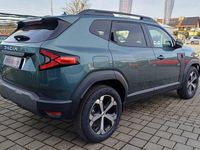 Neu Dacia Duster Journey 101 PS (74 kW) 2025 Zederngrün SUV