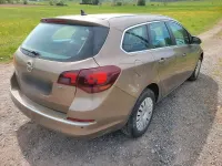 Second-hand Opel Astra 165 CP (121 kW) 2014 Maro Break