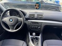 Gebraucht BMW 116 122 PS (89 kW) 2009 Schwarz Kleinwagen