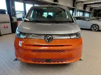 Używany VW Multivan Life 150 KM (110 kW) 2025 Pomarańczowy Minivan