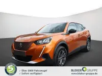 Gebraucht Peugeot e-2008 Active 100 kW (136 PS) 2023 Orange SUV