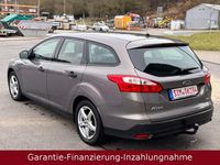 Gebraucht Ford Focus Ambiente 101 PS (74 kW) 2014 Braun Kombi