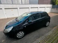 Używany Opel Corsa Edition 87 KM (63 kW) 2010 Czarny Hatchback