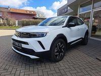 Gebraucht Opel Mokka-e Elegance 100 kW (136 PS) 2024 Lack weiss banquise/typ aussen SUV