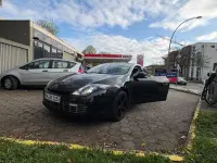 Gebraucht Renault Laguna III 150 PS (110 kW) 2012 Schwarz Coupé