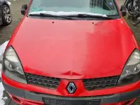 Używany Renault Clio II 58 KM (42 kW) 2010 Czerwony Sedan/Limuzyna