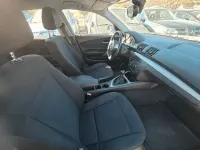 Second-hand BMW 116 122 CP (89 kW) 2008 Negru Hatchback
