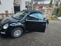 Gebraucht VW New Beetle 100 PS (73 kW) 2005 Schwarz Kleinwagen