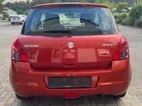 Gebraucht Suzuki Swift 92 PS (67 kW) 2010 Orange Kleinwagen