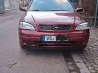 Używany Opel Astra 101 KM (74 kW) 2000 Czerwony Sedan/Limuzyna