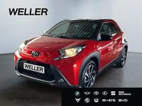 Gebraucht Toyota Aygo 72 PS (52 kW) 2025 Chili red / night sky black (rot) Kleinwagen