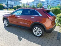 Gebraucht Cadillac XT4 230 PS (169 kW) 2022 Autumn orange metallic SUV