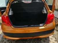 Gebraucht Peugeot 207 86 PS (63 kW) 2006 Orange Kleinwagen