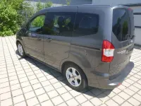 Gebraucht Ford Tourneo Courier Trend 101 PS (74 kW) 2015 Grau Van / Kleinbus