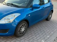 Second-hand Suzuki Swift 94 CP (69 kW) 2011 Albastru Hatchback
