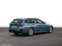 Gebraucht BMW 330e Comfort Edition 292 PS (214 kW) 2025 Arctic race blue metallic Kombi