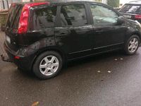 Second-hand Nissan Note 100 CP (73 kW) 2008 Negru Hatchback