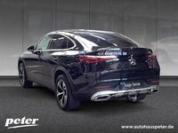 Gebraucht Mercedes GLC300e Advanced 313 PS (230 kW) 2024 Metalliclack obsidianschwarz Coupé