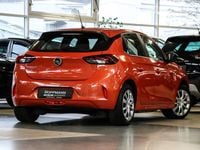 Gebraucht Opel Corsa-e Basis 100 kW (136 PS) 2022 Power orange/dynamik orange Kleinwagen