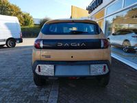 Gebraucht Dacia Spring Extreme 47 kW (65 PS) 2024 Beige safari Kleinwagen