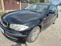 Second-hand BMW 116 122 CP (89 kW) 2008 Negru Hatchback